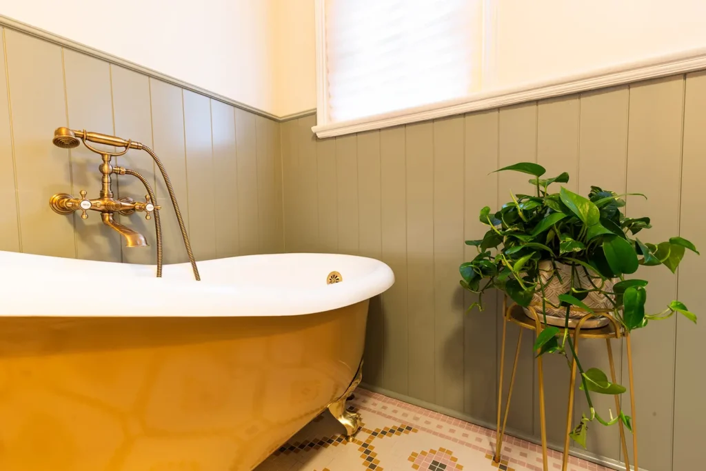 Bathroom renovation with brass fixtures