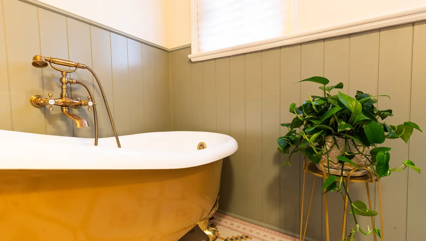 Bathroom renovation with brass fixtures